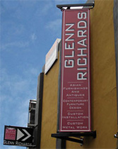 Vinyl banners installed onto custom frame system on Denny Avenue | Seattle, WA